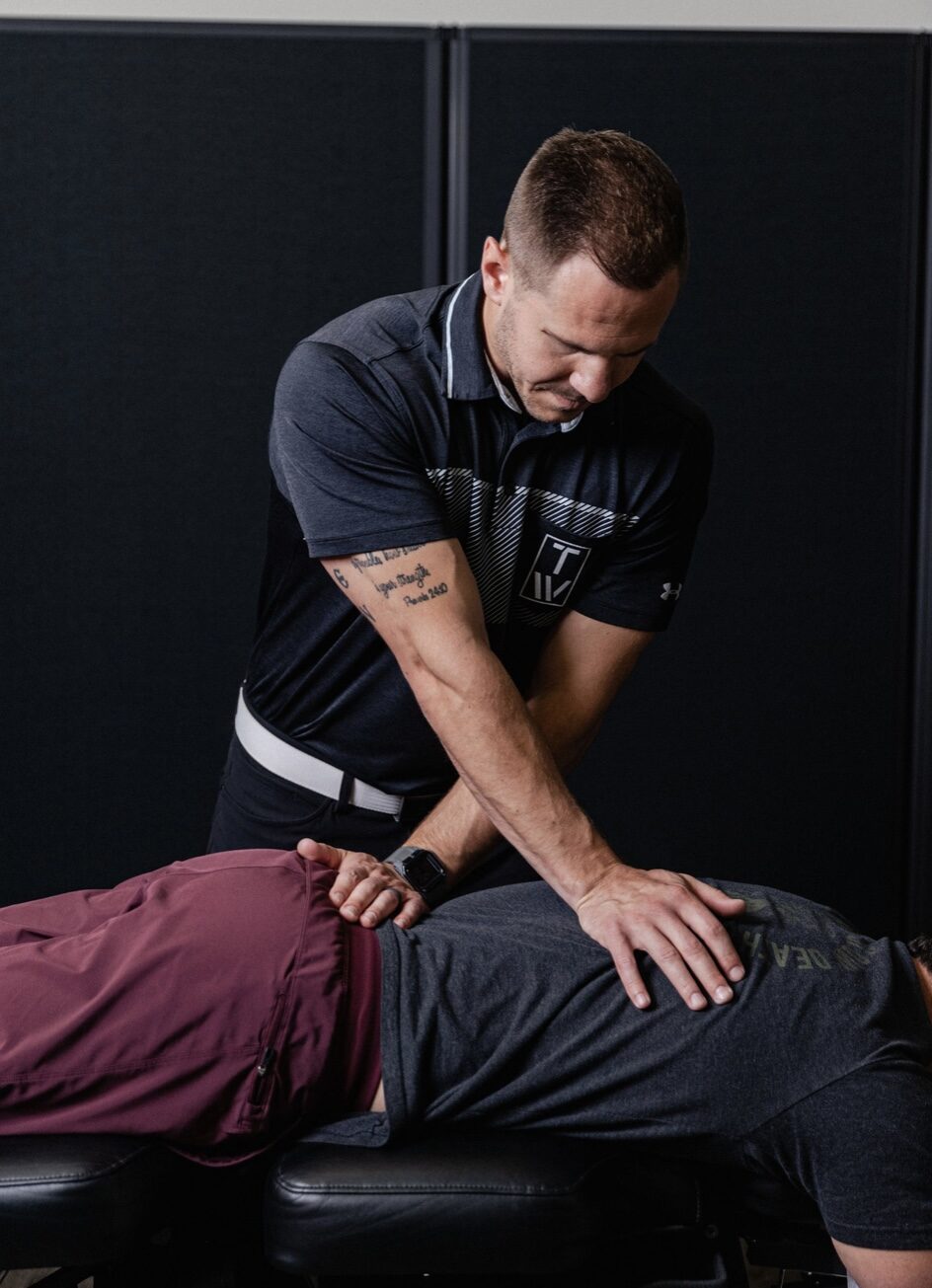 Focused, hands-on spinal treatment at Transform Wellness